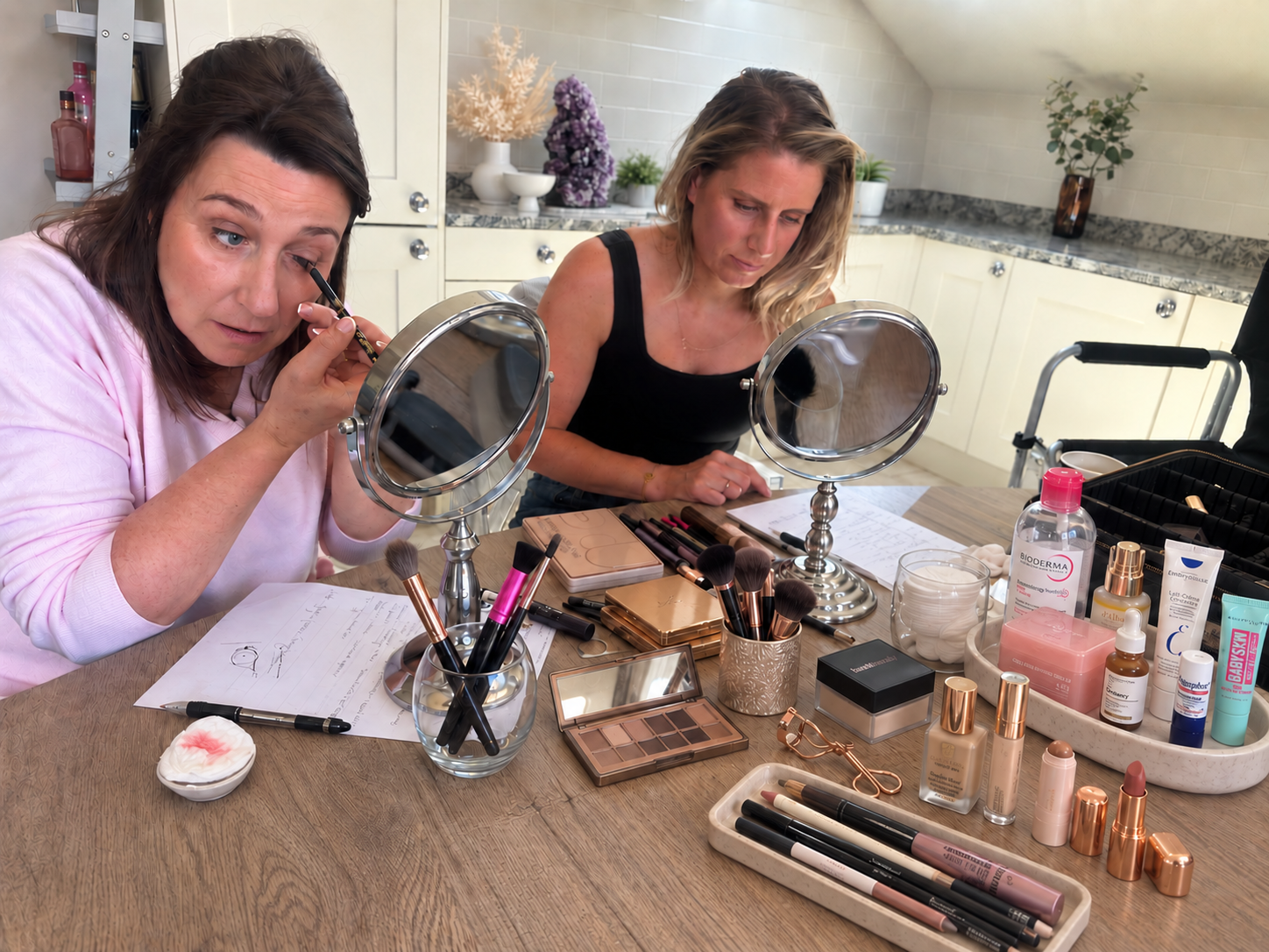 makeup-lesson-harrogate-mel-england Two women practising makeup with mirrors during a shared lesson in Harrogate